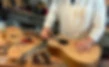 LUTHIER IN HIS WORKSHOP RESTORING A CLASSICAL GUITAR. CRAFTSMAN CONCEPT..jpg
