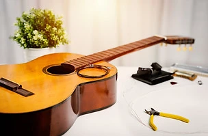 Restring classical guitar concept. Close