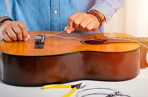 Restring%20classical%20guitar%20concept.