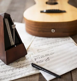Sheet Music and Guitar